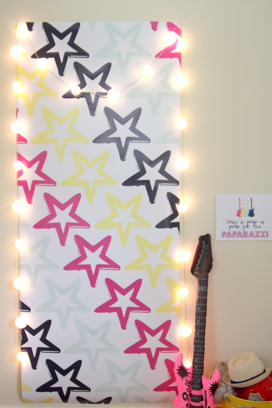 Time to party like a rock star! This sweet rock star birthday party includes all sorts of party ideas- like this cute 'paparazzi' photo booth!