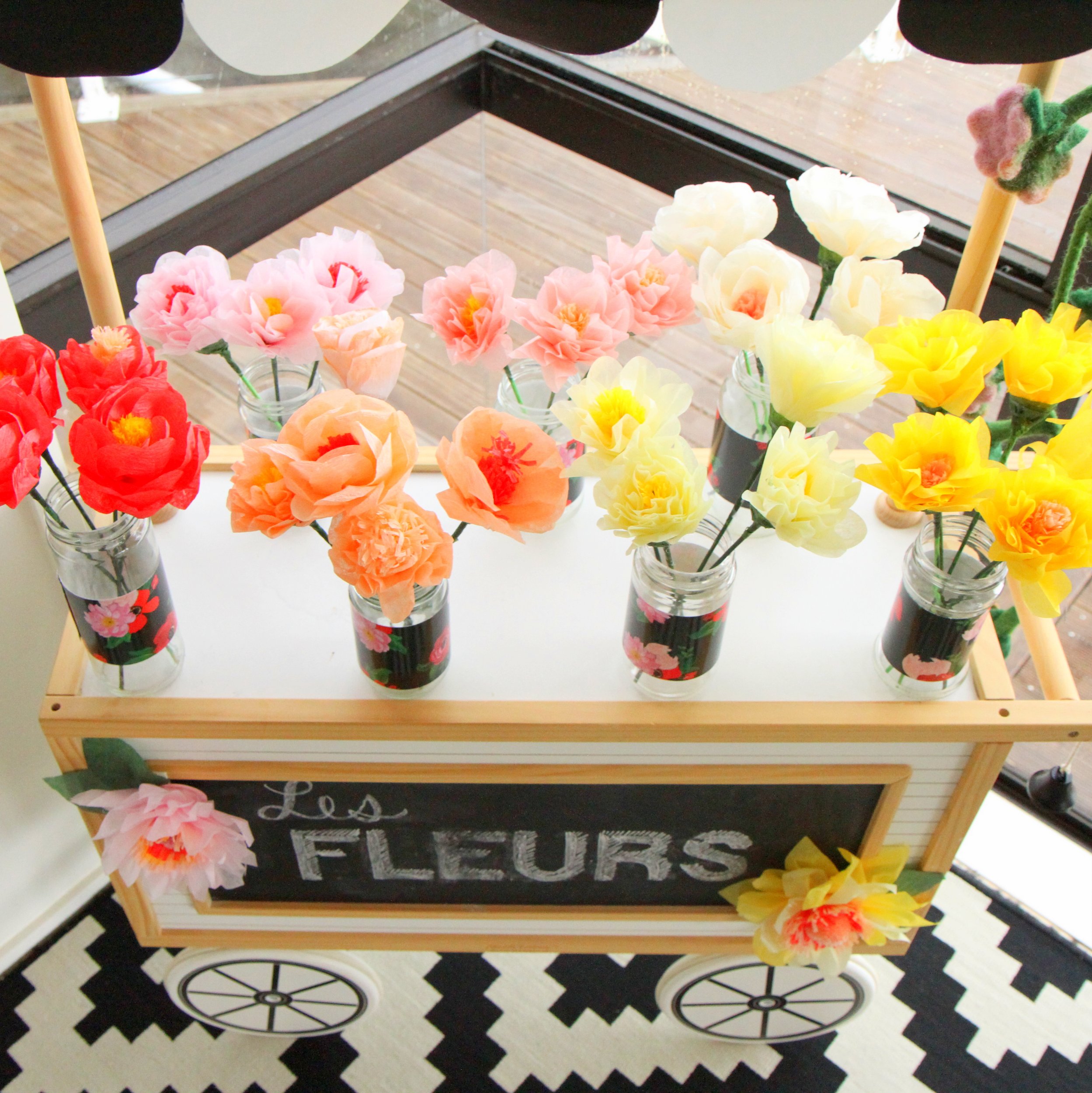 kid's birthday party paper flower bar