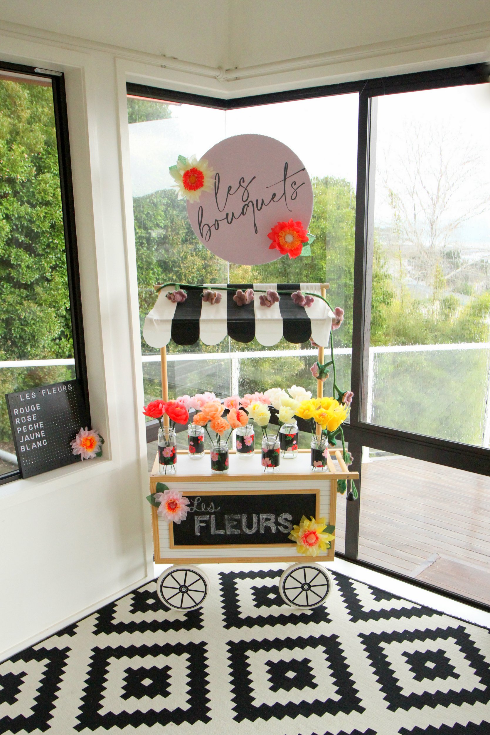 build your own bouquet bar for a paris themed birthday party