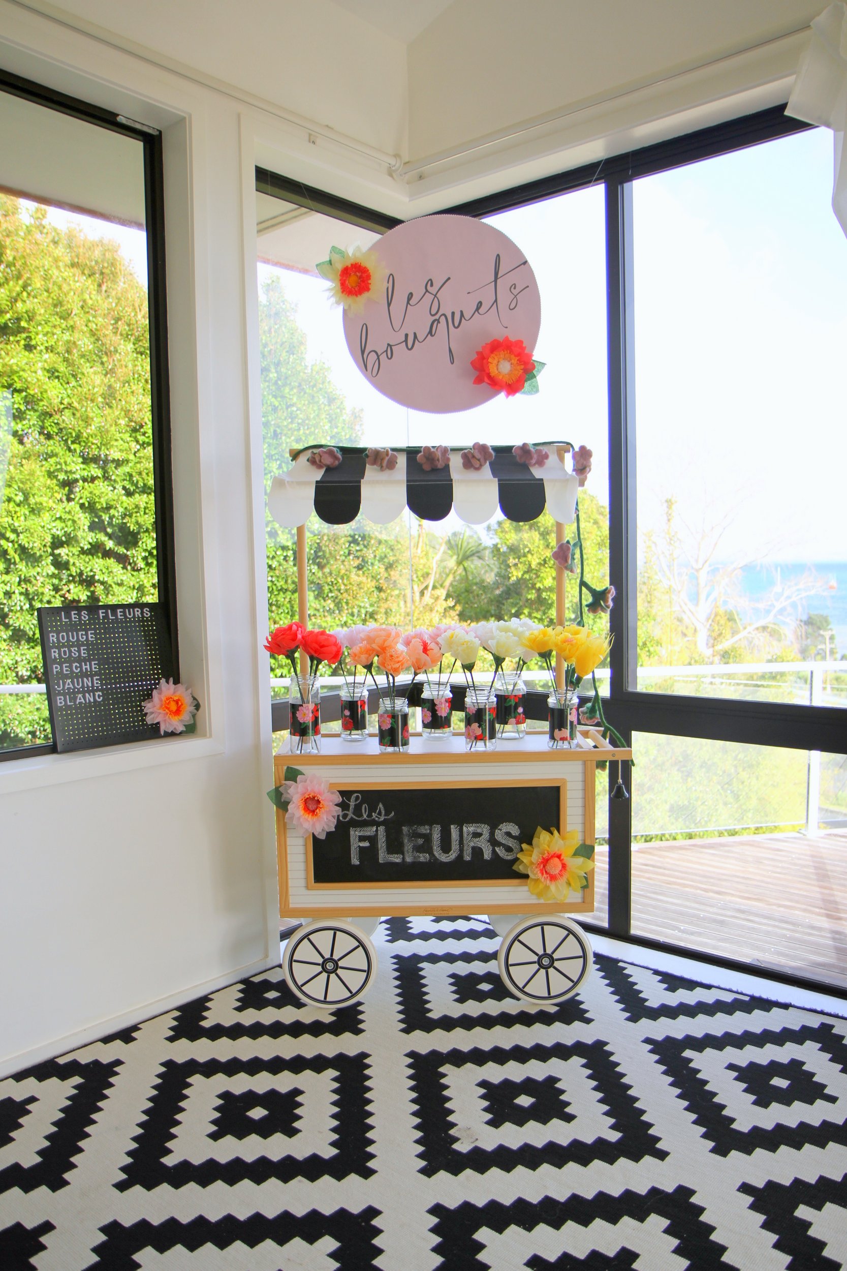build your own bouquet bar for a paris themed birthday party